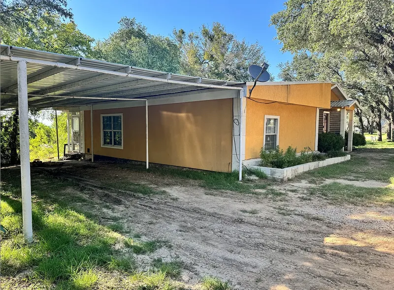 Rural single-family home near Brownwood, Texas before renovation, financed with a cash-out refinance and rehab funding